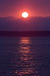 Sunset over the Olympic Mountains and Puget Sound.  Seattle, WA.
